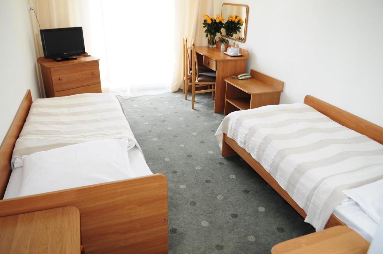 Twin Room with two separate beds with a balcony